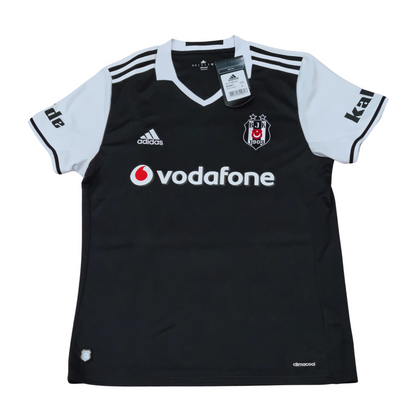 A Adidas Besiktas 2016 Away Jersey, made by Adidas, featuring a black and white design with a logo on it.