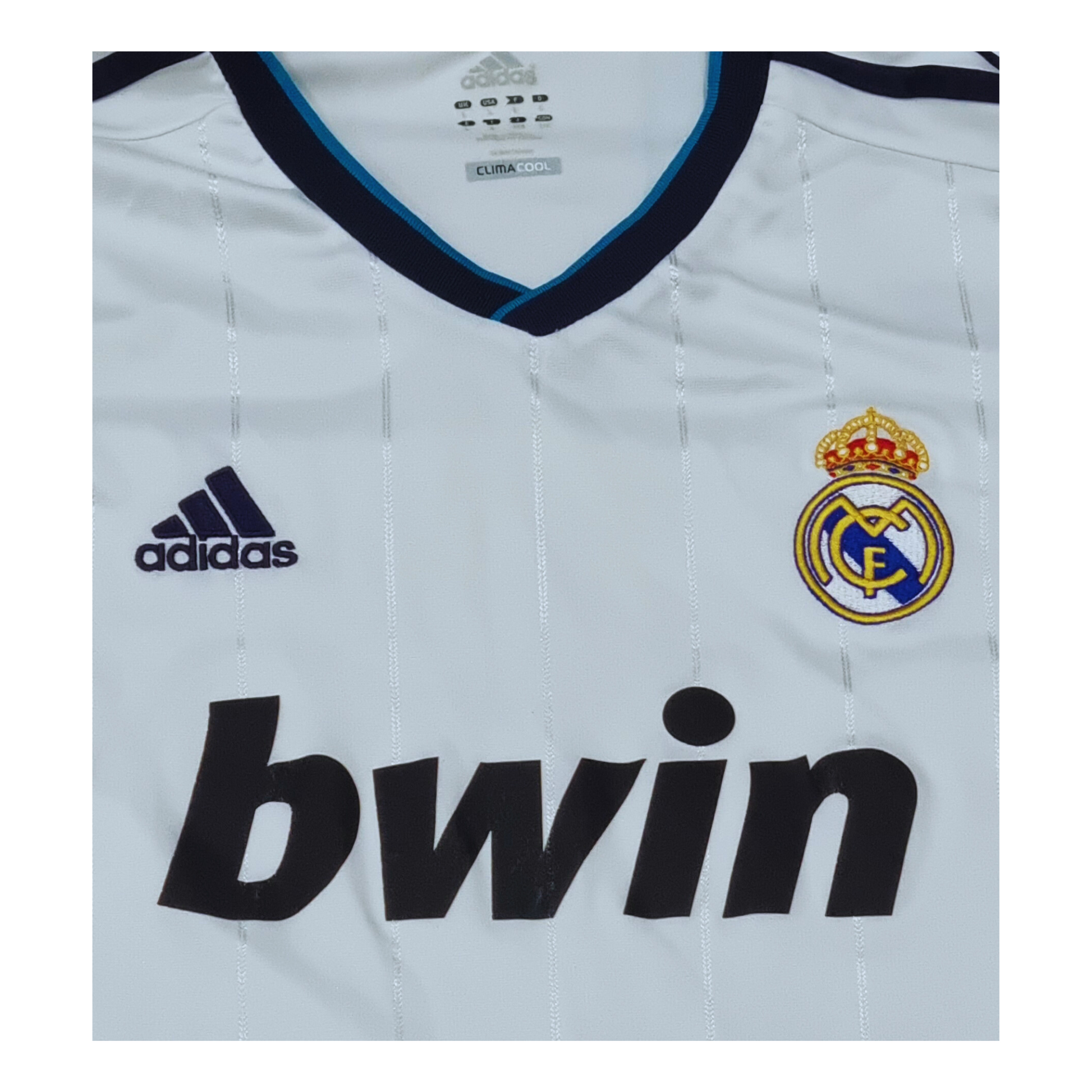 An authentic Adidas Real Madrid 2012/13 Home Jersey, proudly displaying the iconic "Real Madrid" on the front.