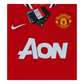 A Nike Manchester United 2011/12 Home Jersey with a tag on it.